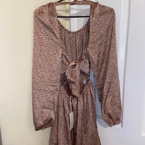Polka Dotted Brown Dress
Size Large
Brand New with tags
From Lush - Picture 6 of 6